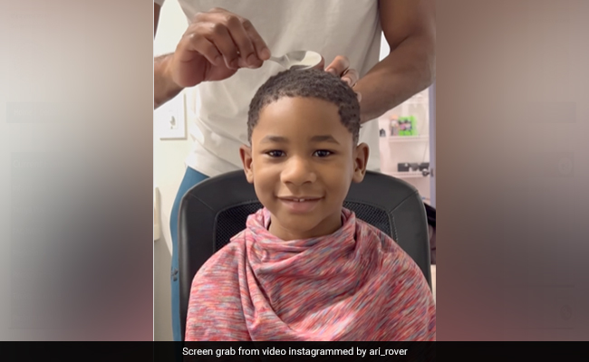 Watch: Father Uses Kitchen Spoon To Give His Son A Haircut, Internet Calls It "Magical"