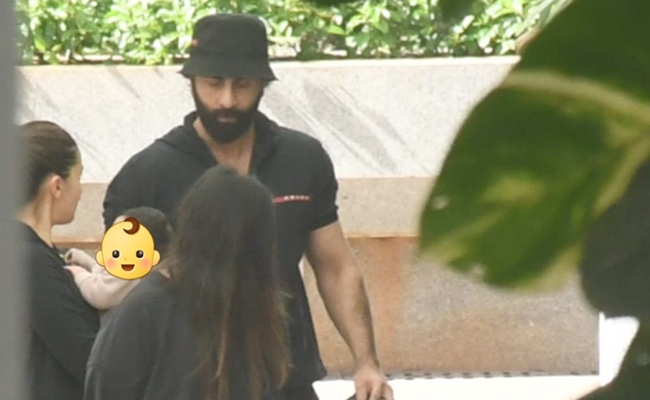 Pics: Alia Bhatt, Ranbir Kapoor Step Out With Daughter Raha For A Walk