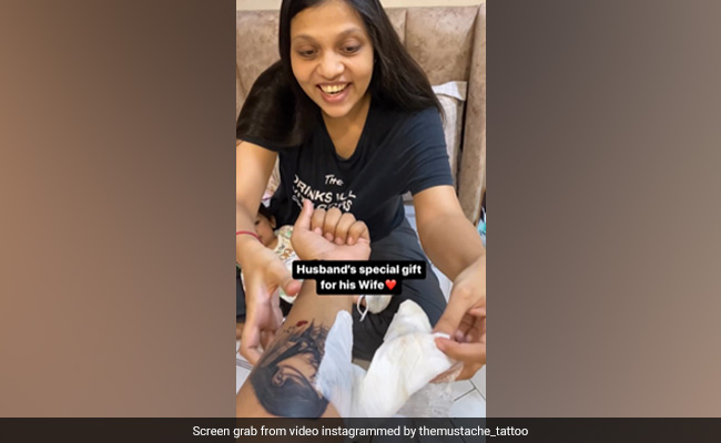 Watch: Husband Surprises Wife By Getting Her Portrait Tattooed On His Arm