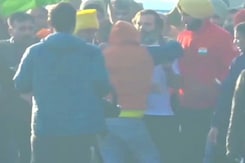 Security Breach At Rahul Gandhi Yatra, Man Hugs Him, Pulled Away Security Breach At Rahul Gandhi Yatra, Man Hugs Him, Pulled Away
