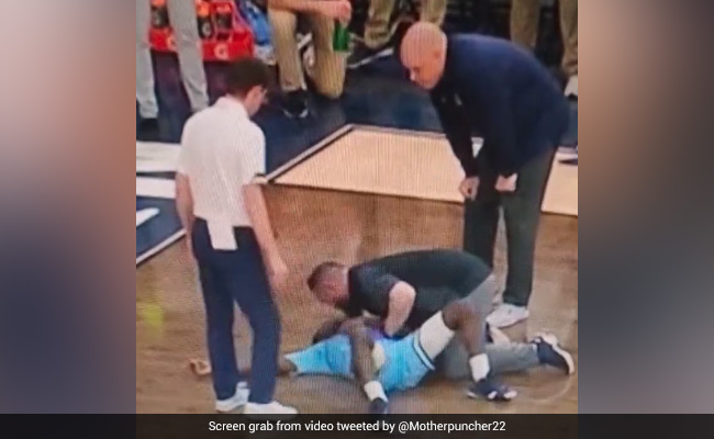 Shocking Video Shows College Basketball Player Collapsing On Court During Game