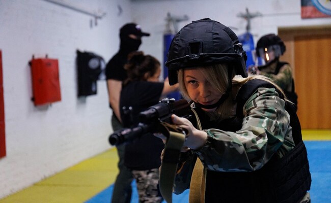 Russian Women Learn To Shoot As Ukraine War Rages