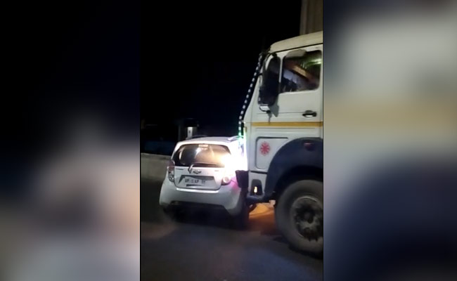 Video: Drunk UP Man Drags Car With Container Truck, Narrow Escape For 4