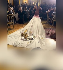 Watch: Model Walks Ramp With Tablecloth Dress With Food On It At Copenhagen Fashion Week Watch: Model Walks Ramp With Tablecloth Dress With Food On It At Copenhagen Fashion Week
