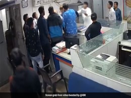 Video: Customer Thrashes Bank Employee In Gujarat Over Loan Dispute Video: Customer Thrashes Bank Employee In Gujarat Over Loan Dispute