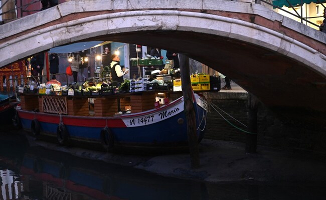 Gondolas In Venice Sit Still On Mud As Low Tides, No Rain Leave Canals Dry