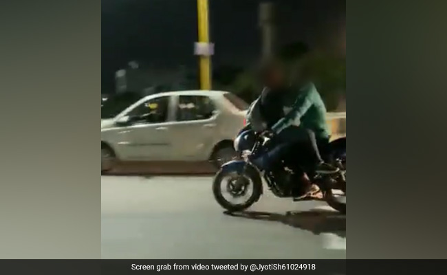 Watch: Couple's Public Display Of Emotion On Bike Lands Them In Trouble