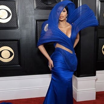 cardi b grammy blue dress Surfs Large Stylish Waves In A Gaurav Gupta Gown At The 65th Awards 2023 Fashion