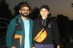 Anushka-Virat Greet Paparazzi Before Flying Out Of Mumbai Anushka-Virat Greet Paparazzi Before Flying Out Of Mumbai