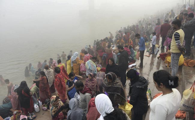 Devotees Take Holy Dip In Ganga In Varanasi On 'Magh Purnima'