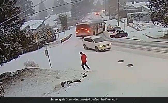 On Camera, Bus Crashes Into Cars After Sliding Down Icy Street In Canada