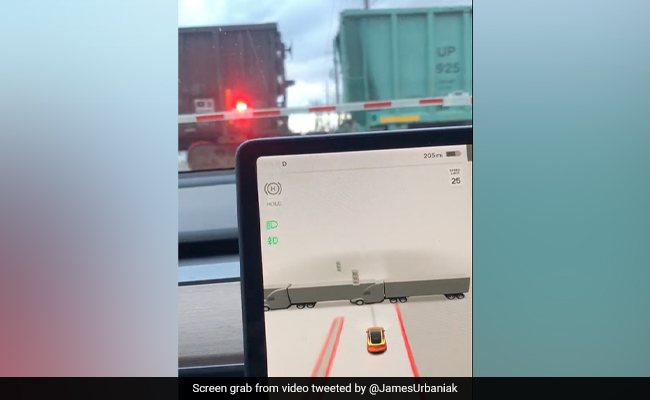 Man Shares Video Of Tesla Car Mistaking Train For Trucks, Internet Cracks Up