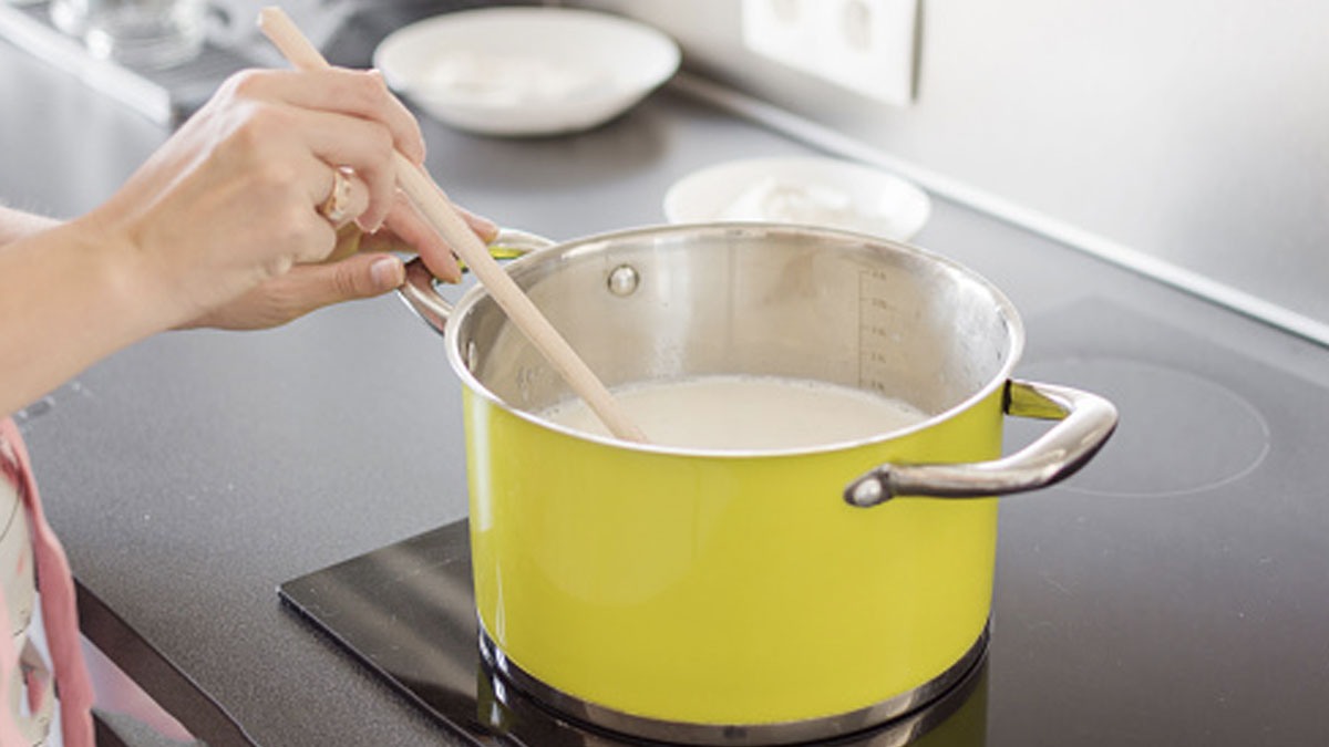 You should stir the milk while boiling according to the nutritionist