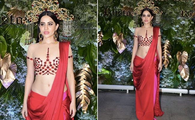 Uorfi Javed's Slinky Red <i>Saree</i> With A Naked Bejewelled <i>Saree</i> Blouse Made Sure She Was The Star Of The Night