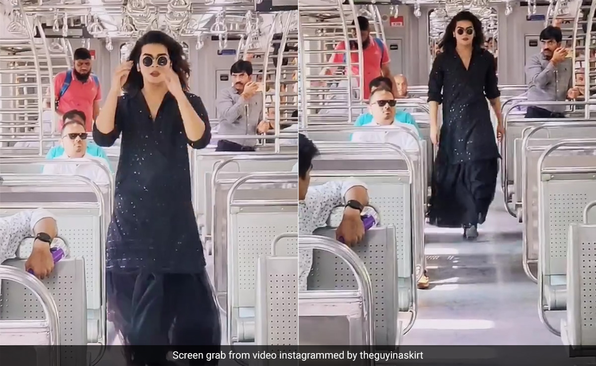 मुंबई लोकल में स्कर्ट पहनकर कैटवॉक कर रहा था शख्स, आंखे फाड़कर देखते रहे यात्री, यूजर्स बोले- क्या कॉन्फिडेंस है...