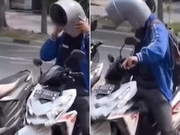 VIDEO: बिना हेलमेट घूम रहा था स्कूटी सवार, पुलिस को देखते ही पहन लिया अजीबोगरीब ताज! VIDEO: बिना हेलमेट घूम रहा था स्कूटी सवार, पुलिस को देखते ही पहन लिया अजीबोगरीब ताज!