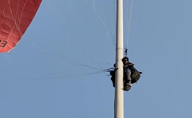 Watch: Paragliding Gone Wrong, Two People Stuck On An Electric Pole In Kerala