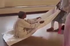 No Stretcher For Elderly Man With Broken Leg, Dragged On Cloth At Gwalior Hospital No Stretcher For Elderly Man With Broken Leg, Dragged On Cloth At Gwalior Hospital