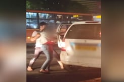 Delhi Man Assaults, Pushes Woman Into Cab On Busy Road. No One Helps Her Delhi Man Assaults, Pushes Woman Into Cab On Busy Road. No One Helps Her