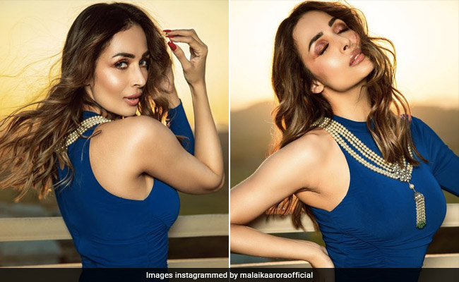 Along With Copper Winged Eyes, Malaika Arora's Glowing Skin Shines Brighter Than The Sunset Behind Her