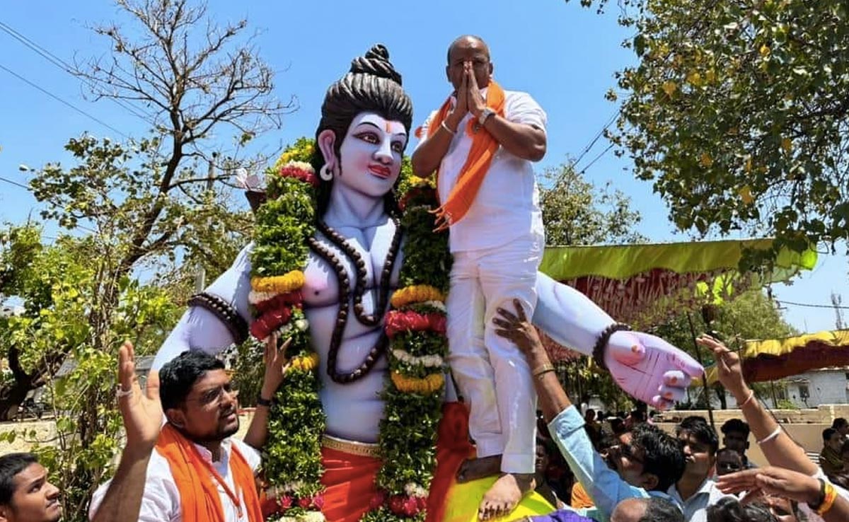 Karnataka BJP MLA Under Fire For Climbing Lord Ram Statue, Posing For Pics