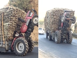 बीच सड़क पर गन्ने से लदे ओवरलोड ट्रैक्टर से स्टंट करता नजर आया ड्राइवर, Video देख भड़के यूजर्स बीच सड़क पर गन्ने से लदे ओवरलोड ट्रैक्टर से स्टंट करता नजर आया ड्राइवर, Video देख भड़के यूजर्स