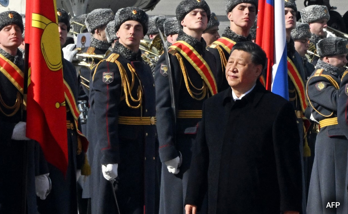 China's Xi Jinping Arrives In Moscow For Summit With Putin