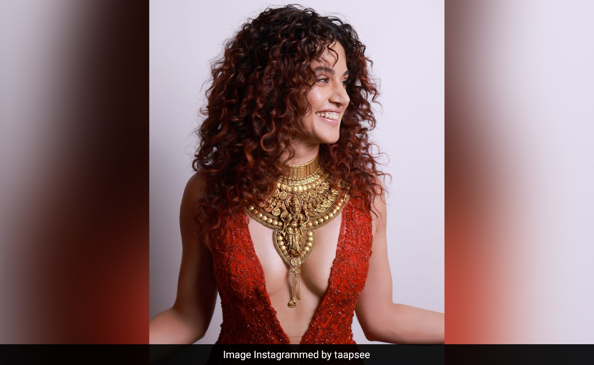In A Red Gown, Taapsee Pannu Is Showing Us The Most Modern Way To Wear Our Gold Heirloom Jewellery