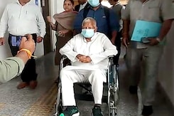 Lalu Yadav Arrives In A Wheelchair For CBI Questioning In Land-For-Jobs Case Lalu Yadav Arrives In A Wheelchair For CBI Questioning In Land-For-Jobs Case
