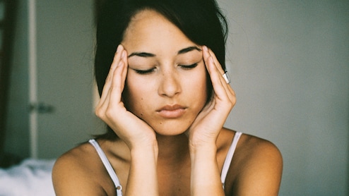 Waking Up With A Headache? Here's Why, And What To Do About It