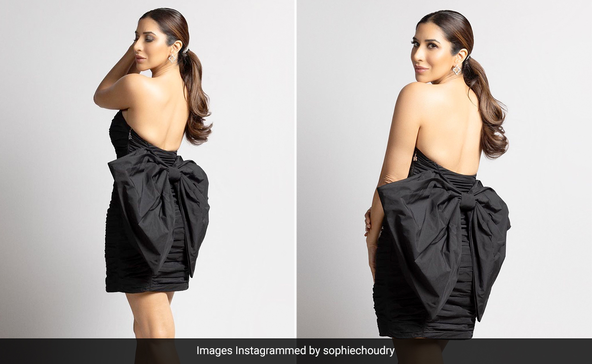 Sophie Choudry's Strapless Black Dress With An Oversized Bow Makes Her Most Fabulous Present We've Ever Seen