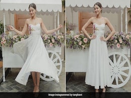 Ananya Panday's Delightful White Halter Midi Dress Practically Screams Summer Ananya Panday's Delightful White Halter Midi Dress Practically Screams Summer