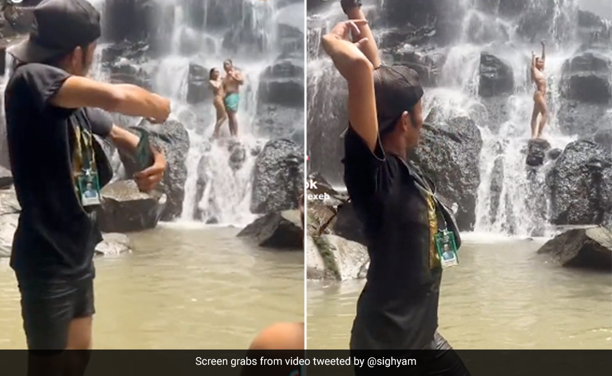 झरने के नीचे कपल को फोटो के लिए पोज़ बनाना सिखा रहा था टूर गाइड, लोगों ने लिए खूब मज़े, Video देख नहीं रुकेगी हंसी