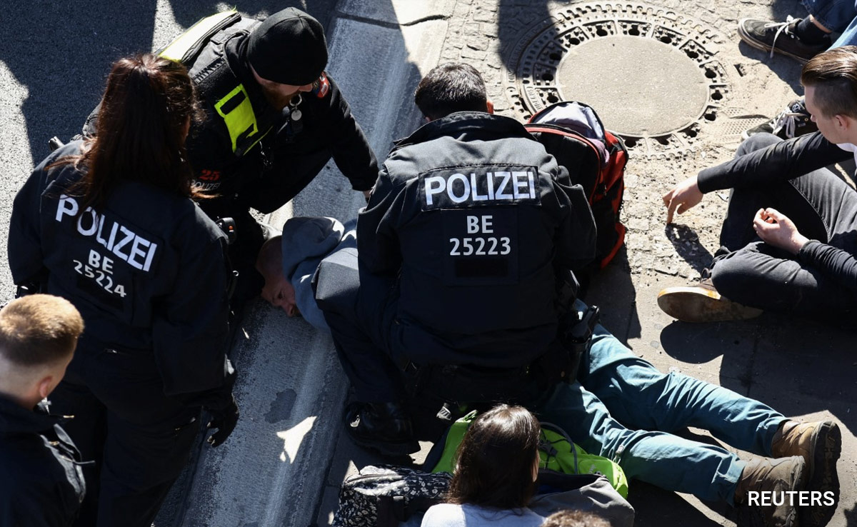 Climate Activists Glue Themselves To Roads, Block Traffic In Berlin