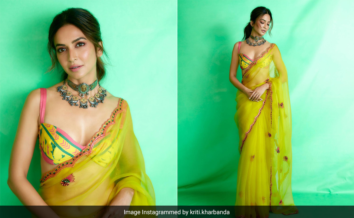 Kriti Kharbanda's Yellow Organza <i>Saree</i> With A Bikini Blouse Screams Modern Ethnic Fashion
