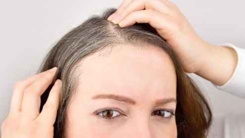 Premature Hair Greying: What's Triggering It And How To Reverse The Trend