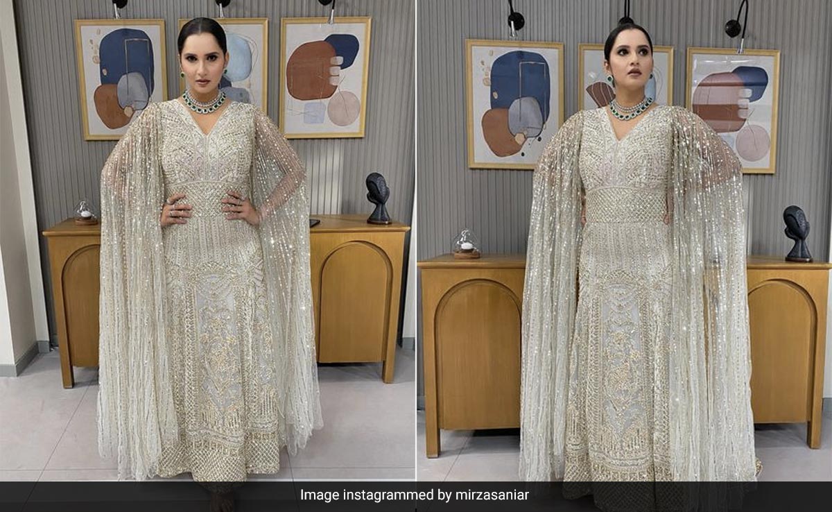 In This Case, "The Glitz And The Glam" Is Sania Mirza In A Glittering Silver Falguni Shane Peacock Gown With Cape Sleeves