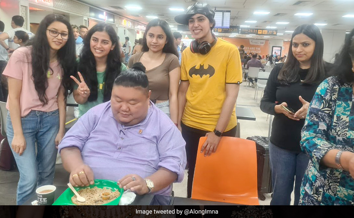 "Not Ignoring You": Nagaland Minister Temjen Imna Along Posts Photo With Girls With His Focus On Food