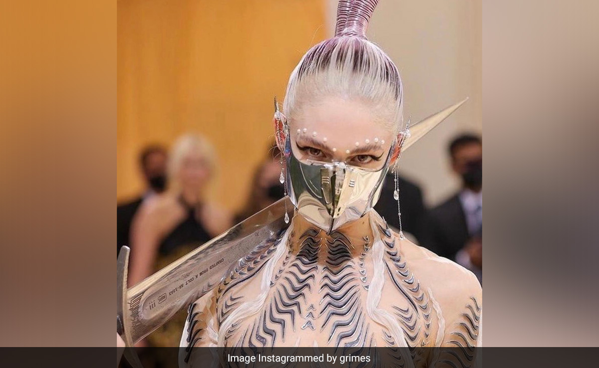 Singer Grimes Says AI Can Use Her Voice For Songs "Without Penalty"