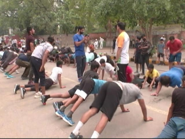 Protesting Wrestlers 'HIIT' The Street