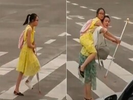 बैसाखी के सहारे सड़क पार कर रही थी बच्ची, थककर सड़क पर ही रुक गई, फिर जो हुआ उसे देखकर... बैसाखी के सहारे सड़क पार कर रही थी बच्ची, थककर सड़क पर ही रुक गई, फिर जो हुआ उसे देखकर...