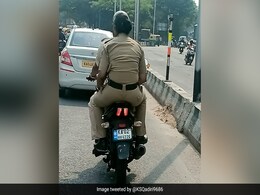 Bengaluru Cop Caught Riding Pillion Without Helmet, Traffic Police Responds Bengaluru Cop Caught Riding Pillion Without Helmet, Traffic Police Responds