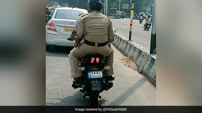 caught riding motorcycle without helmet Bengaluru Cop Caught Riding Pillion Without Helmet, Traffic Police Responds