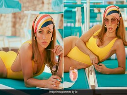 Jennifer Lopez In A Sunshine Yellow Swimsuit Touches The Boiling Point Of Summer Jennifer Lopez In A Sunshine Yellow Swimsuit Touches The Boiling Point Of Summer