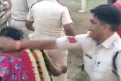 Cop Pulls Woman's Hair, Kicks Her During Anti-Encroachment Drive Cop Pulls Woman's Hair, Kicks Her During Anti-Encroachment Drive