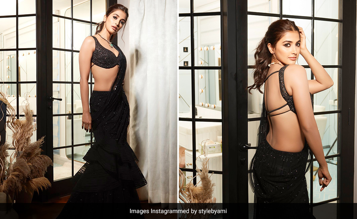 The Showstopper Of Pooja Hegde's Stunning Black Saree Is The Shimmery Backless Blouse She Paired With It