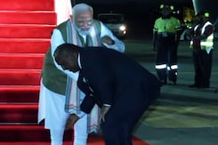Watch: Papua New Guinea PM Touches PM Modi's Feet During Welcome Ceremony Watch: Papua New Guinea PM Touches PM Modi's Feet During Welcome Ceremony