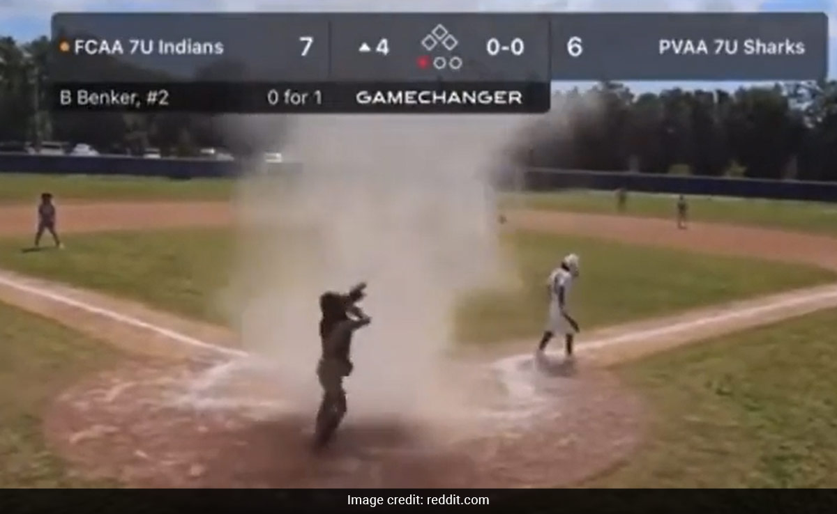 Watch: Quick-Thinking Umpire Saves Child Caught In Dust Devil