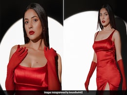 She Is No Bond Girl Yet Unless The Spotlight On Shehnaaz Gill's Red Satin Dress With Gloves Seem So She Is No Bond Girl Yet Unless The Spotlight On Shehnaaz Gill's Red Satin Dress With Gloves Seem So