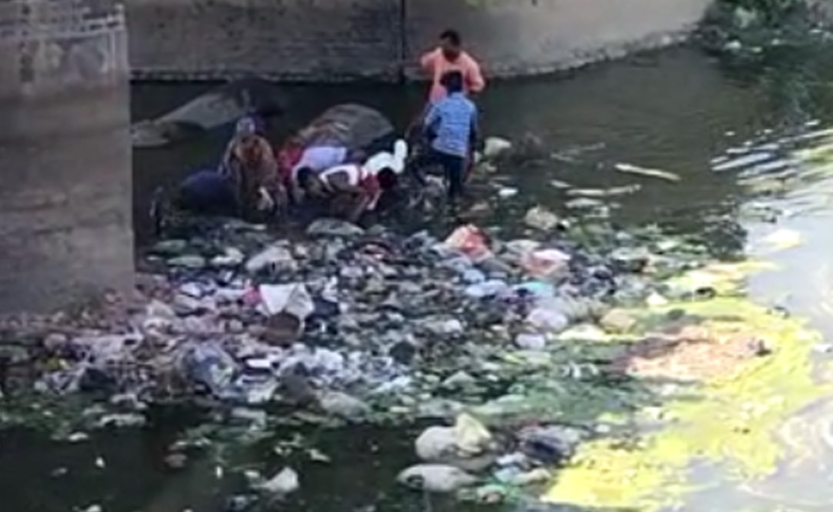 Video: People Seen Walking Through Drain In Bihar Town To Collect Notes